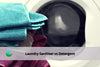 towels infront of the washing machine door for laundry detergent vs laundry sanitising