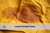 Detergent stain on yellow cloth